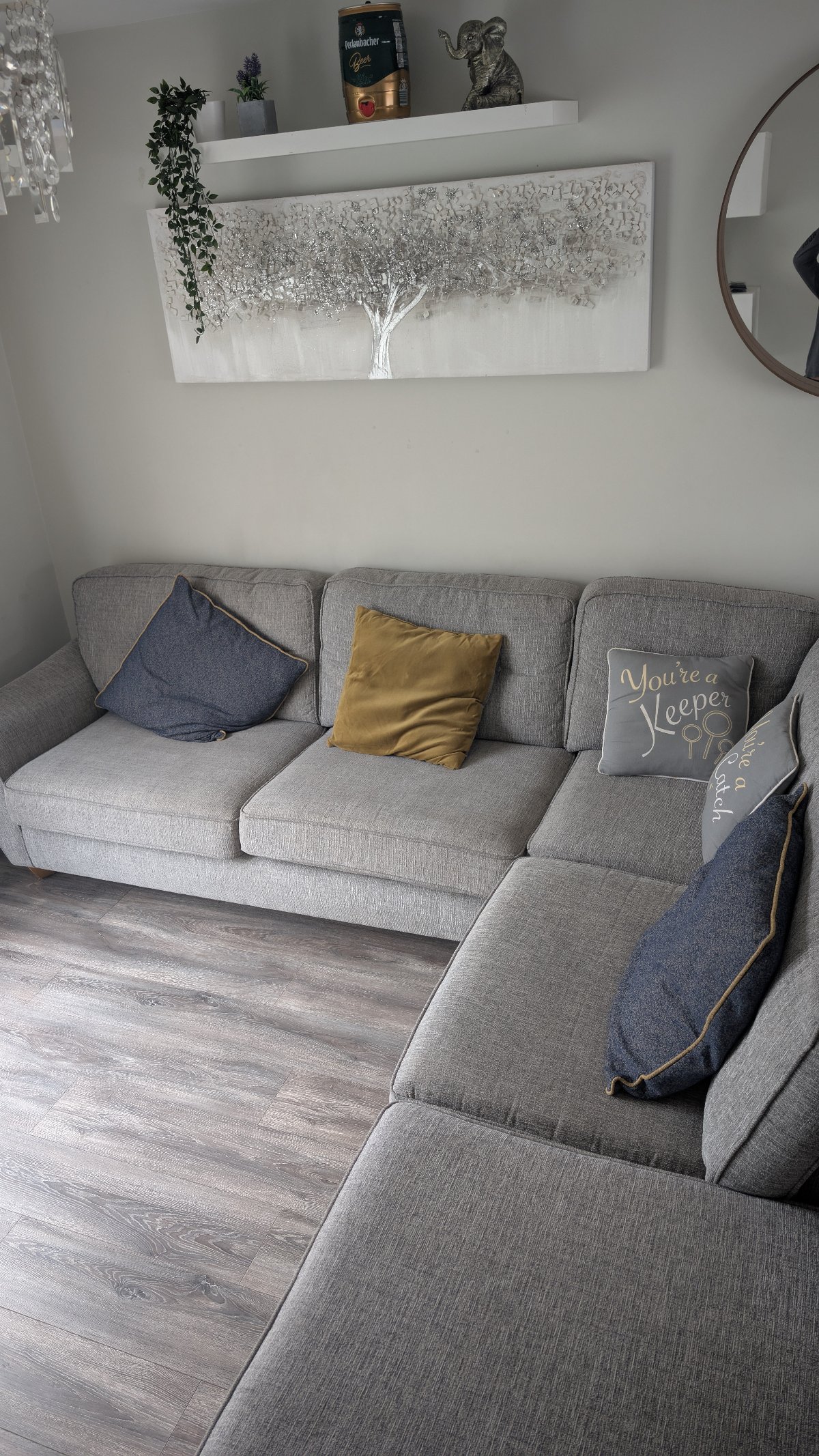 Gray fabric corner chase sofa with footstool