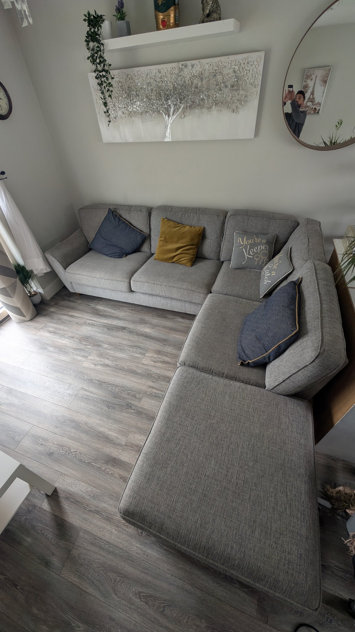 Gray fabric corner chase sofa with footstool