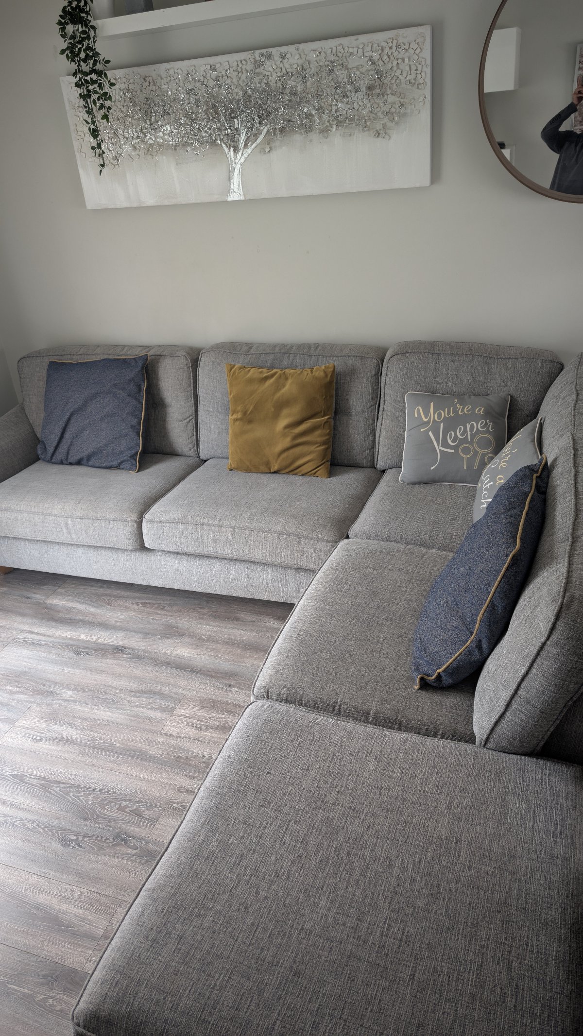 Gray fabric corner chase sofa with footstool
