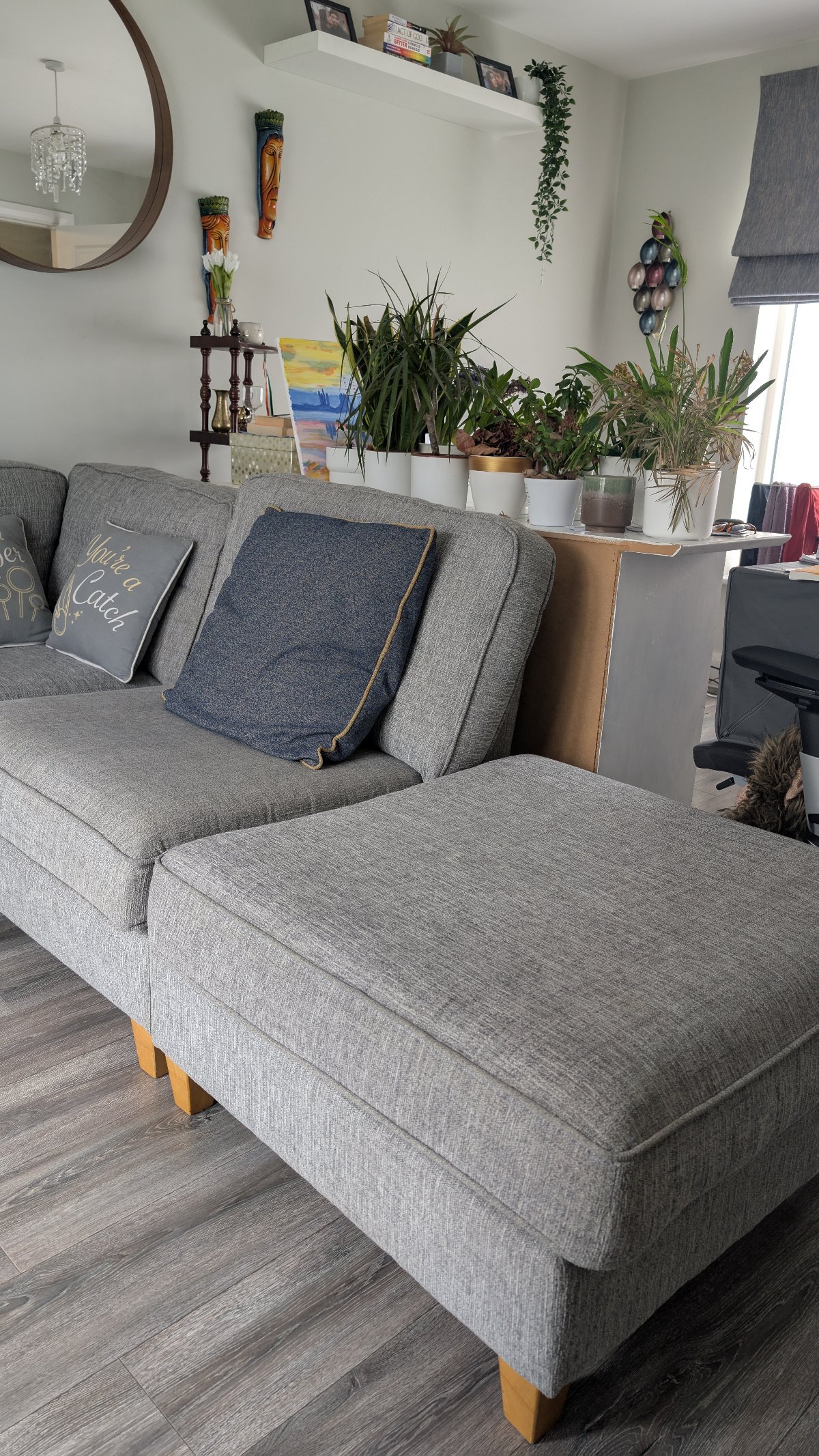 Gray fabric corner chase sofa with footstool