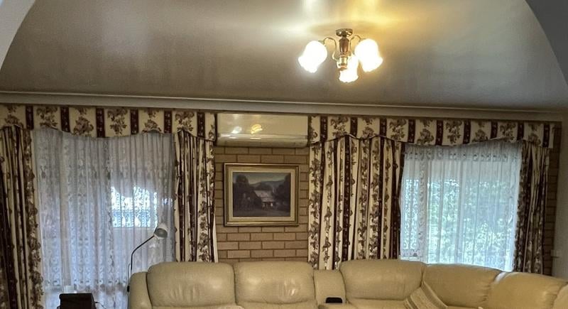 Cream curtains, pair